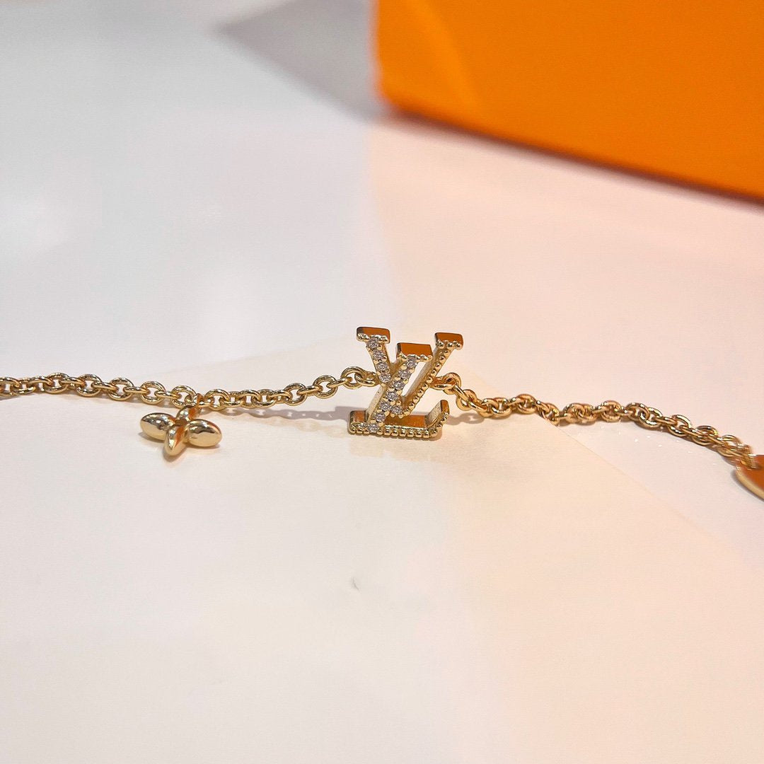 [Love Lucky] GOLDARMBAND MIT LOGO-STERNMOTIV