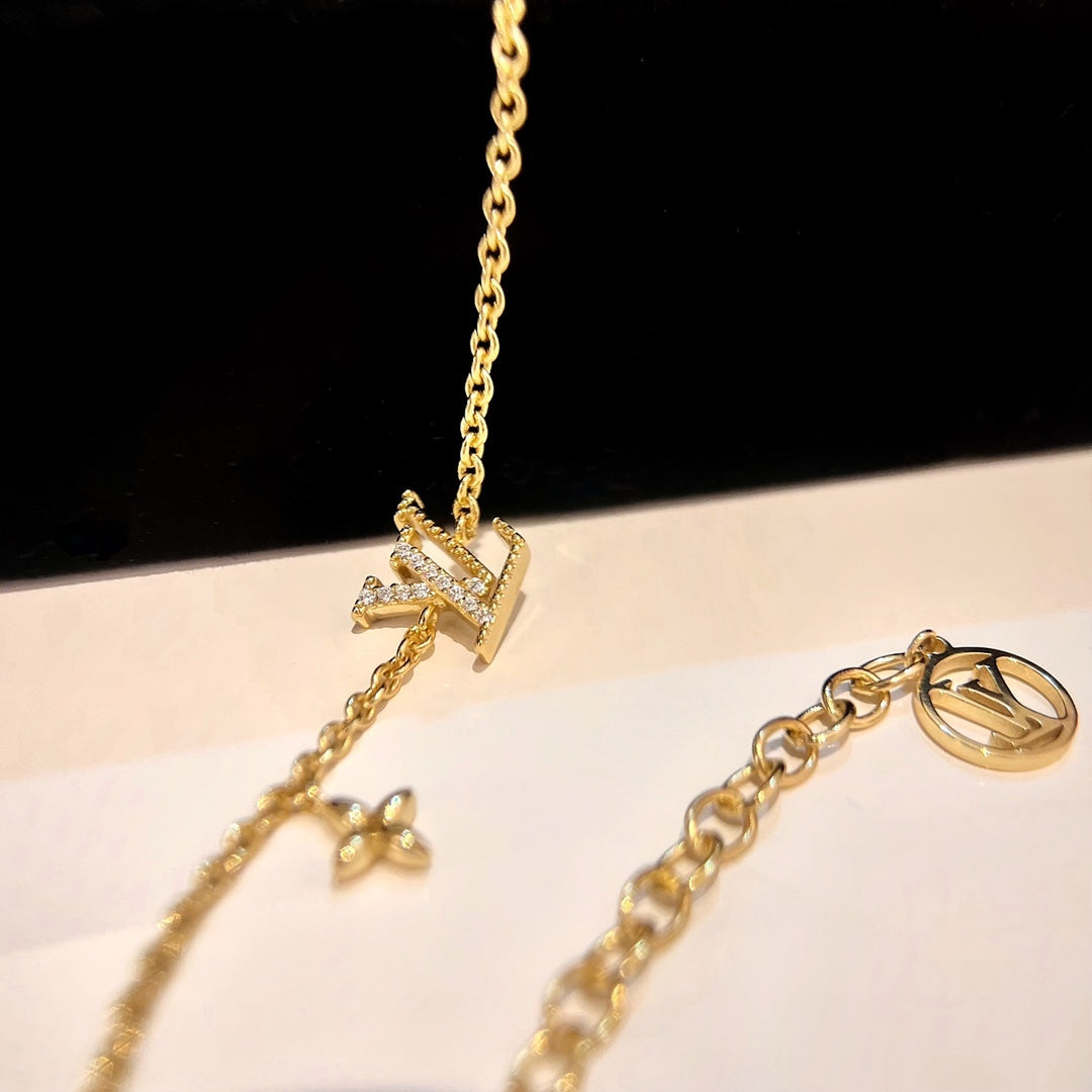 [Love Lucky] GOLDARMBAND MIT LOGO-STERNMOTIV