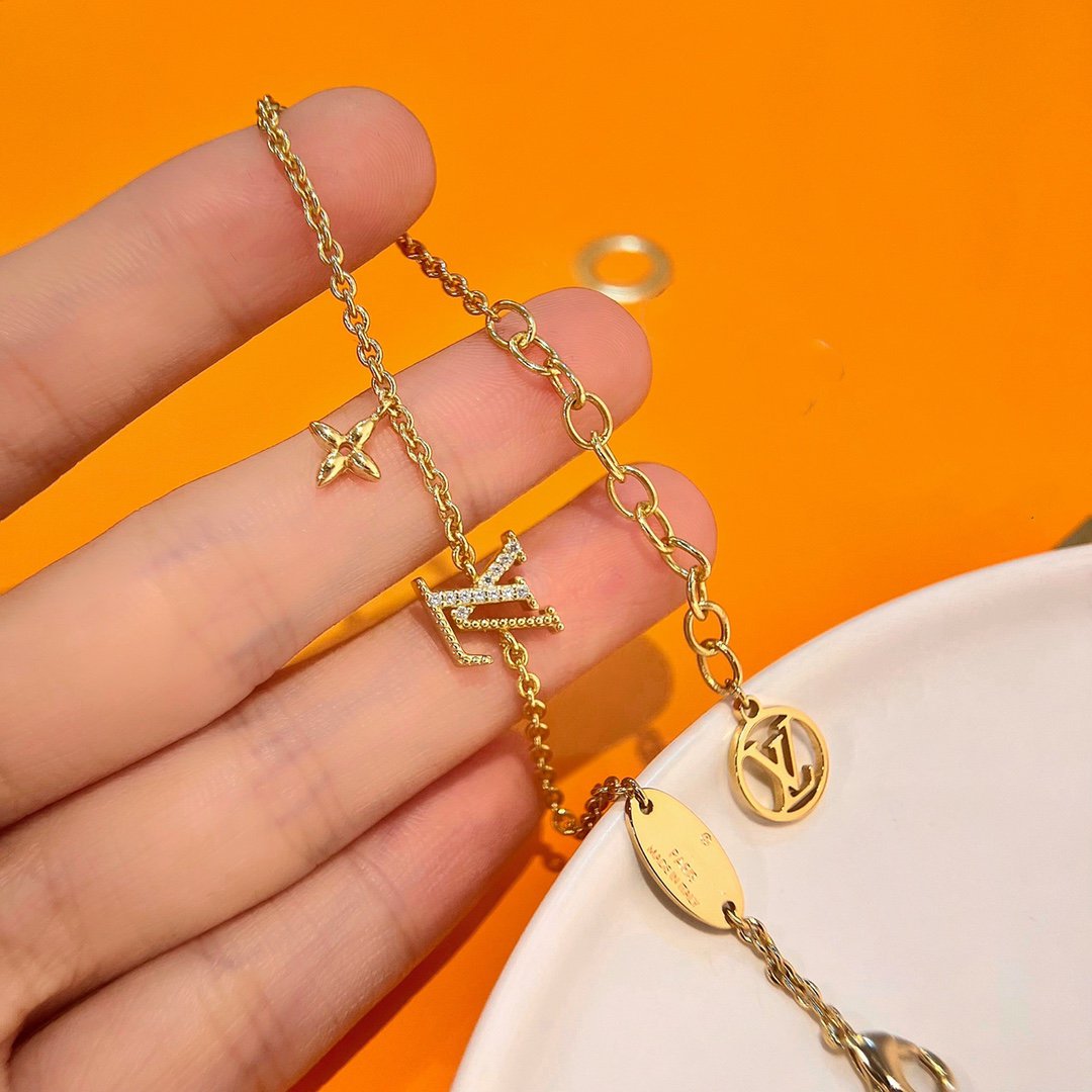 [Love Lucky] GOLDARMBAND MIT LOGO-STERNMOTIV