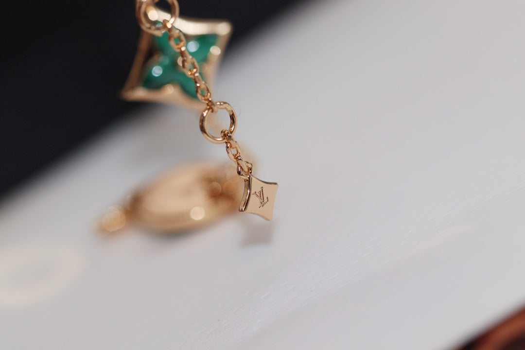 [Love Lucky] Armband aus Roségold mit Stern- und Sonnenmotiv und 4 Malachit-Motiven
