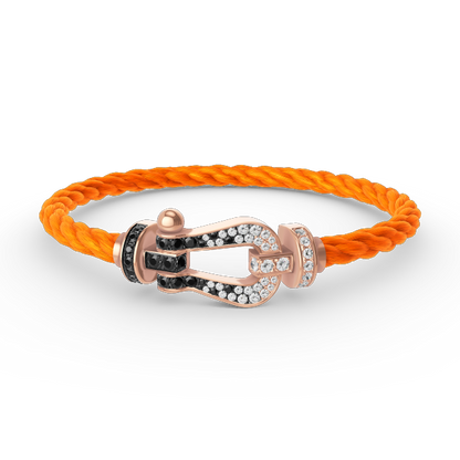 [Love Lucky]FORCE GROSSES HUFEISEN-ARMBAND MIT SCHWARZEN WEISSEN DIAMANTEN UND ROSÉGOLD